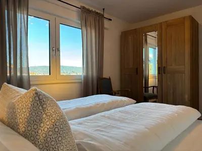 Ein Bett oder Betten in einem Zimmer der Unterkunft Ferienwohnungen Karwendulum