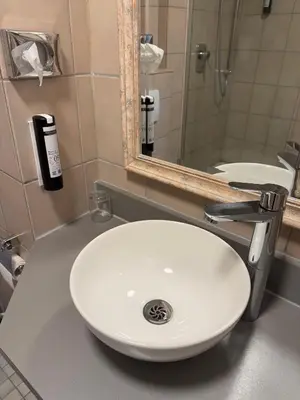 Ein Badezimmer in der Unterkunft Apartment Hotel Huber, Zimmer und Apartments