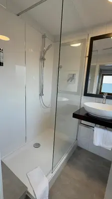 Ein Badezimmer in der Unterkunft Apartment Hotel Huber, Zimmer und Apartments