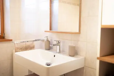 Ein Badezimmer in der Unterkunft Gemütliche Ferienwohnung am Kochelsee