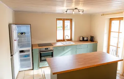 Küche/Küchenzeile in der Unterkunft Gemütliche Ferienwohnung am Kochelsee