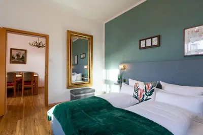 Ein Bett oder Betten in einem Zimmer der Unterkunft Höllental heritage house - Zugspitzblick - 3