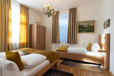 Ein Bett oder Betten in einem Zimmer der Unterkunft Höllental heritage house - Zugspitzblick - 3