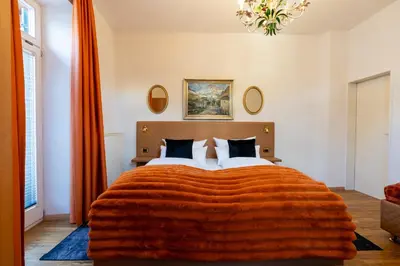 Ein Bett oder Betten in einem Zimmer der Unterkunft Höllental heritage house - Bergblick - 4