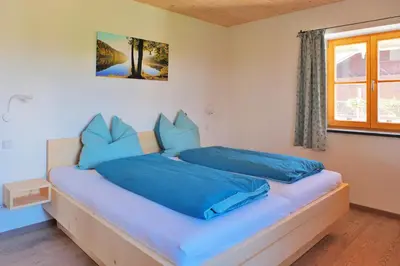 Ein Bett oder Betten in einem Zimmer der Unterkunft ZumKoch