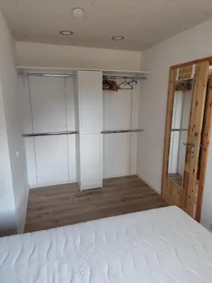 Ein Bett oder Betten in einem Zimmer der Unterkunft FeWo Pfaffenhofen-Ortsteil Blick ins Grüne