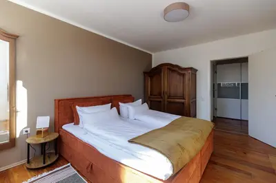 Ein Bett oder Betten in einem Zimmer der Unterkunft Red Fox Apartment