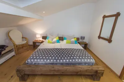 Ein Bett oder Betten in einem Zimmer der Unterkunft Hotel Alpenblick