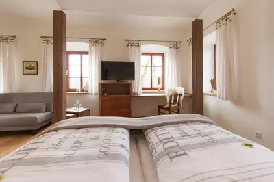 Ein Bett oder Betten in einem Zimmer der Unterkunft Hotel Alpenblick