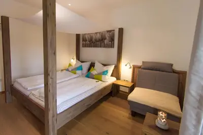 Ein Bett oder Betten in einem Zimmer der Unterkunft Hotel Alpenblick
