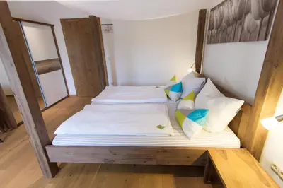 Ein Bett oder Betten in einem Zimmer der Unterkunft Hotel Alpenblick