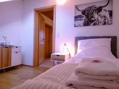 Ein Bett oder Betten in einem Zimmer der Unterkunft Rost Apartments - Staffelsee