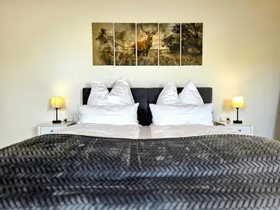 Ein Bett oder Betten in einem Zimmer der Unterkunft Rost Apartments - Staffelsee