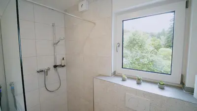 Ein Badezimmer in der Unterkunft YUVA HOMES -2 Zimmer-S-Bahn MUC-Parkplatz