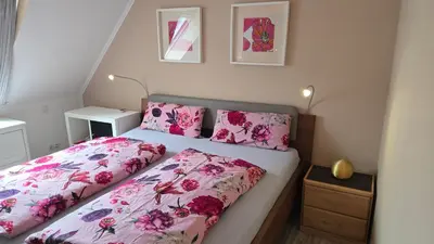 Ein Bett oder Betten in einem Zimmer der Unterkunft Filou - Maisonette City & HBF nah und Wertach-Park vor der Tür