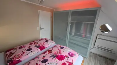 Ein Bett oder Betten in einem Zimmer der Unterkunft Filou - Maisonette City & HBF nah und Wertach-Park vor der Tür