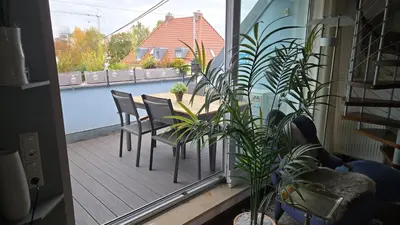 Ein Balkon oder eine Terrasse in der Unterkunft Filou - Maisonette City & HBF nah und Wertach-Park vor der Tür