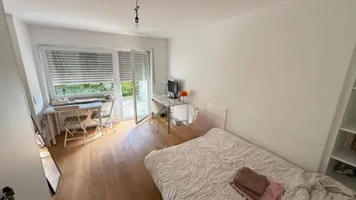 Ein Bett oder Betten in einem Zimmer der Unterkunft Bright Studio with Private Terrace near Nymphenburg Castle
