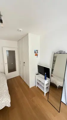 Ein Bett oder Betten in einem Zimmer der Unterkunft Bright Studio with Private Terrace near Nymphenburg Castle