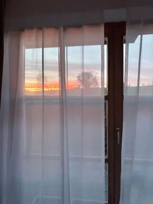 Blick auf den Sonnenuntergang/Sonnenaufgang von der Ferienwohnung aus oder aus der Nähe