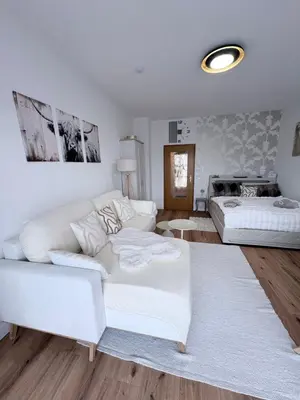 Ein Sitzbereich in der Unterkunft Chiemsee-Perle, stylisches Luxus-Appartement