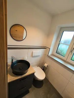 Ein Badezimmer in der Unterkunft Bergjuwel in Bichl 120qm