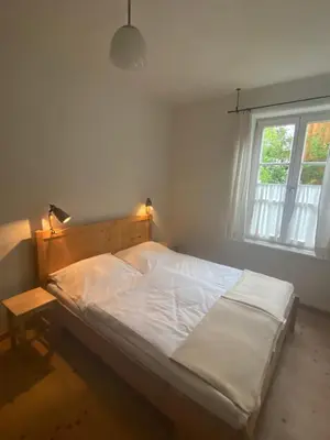 Ein Bett oder Betten in einem Zimmer der Unterkunft Ferienwohnung mit Blick ins Grüne