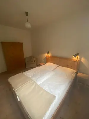 Ein Bett oder Betten in einem Zimmer der Unterkunft Ferienwohnung mit Blick ins Grüne