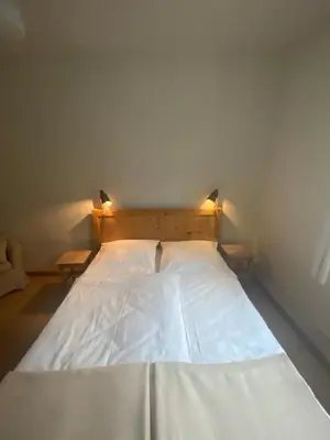 Ein Bett oder Betten in einem Zimmer der Unterkunft Ferienwohnung mit Blick ins Grüne
