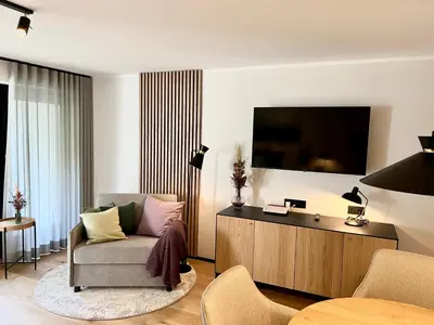 TV/Unterhaltungsangebot in der Unterkunft Pittino Gartensuite 02 in zweiter Seereihe Ammersee