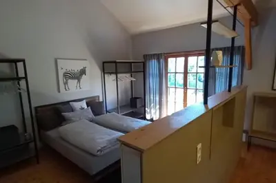 Ein Bett oder Betten in einem Zimmer der Unterkunft NEU! Ferienwohnung Design 2 Wasserburger Land