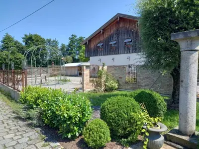 Ein Garten an der Unterkunft NEU! Ferienwohnung Design 1 Wasserburger Land