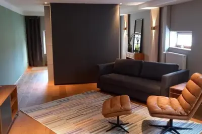 Ein Sitzbereich in der Unterkunft NEU! Ferienwohnung Design 1 Wasserburger Land