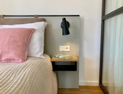 Ein Bett oder Betten in einem Zimmer der Unterkunft GRUNDLERS - Gästehaus am See