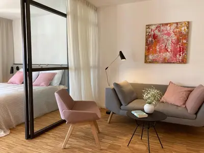 Ein Bett oder Betten in einem Zimmer der Unterkunft GRUNDLERS - Gästehaus am See