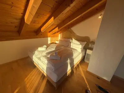 Ein Bett oder Betten in einem Zimmer der Unterkunft ღLiboria I Helle Dachgeschosswohnung in Riegsee-Hagen