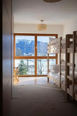 Ein Bett oder Betten in einem Zimmer der Unterkunft ღLiboria I Riegsee-Hagen Helles Refugium mit Bergblick