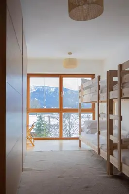 Ein Bett oder Betten in einem Zimmer der Unterkunft ღLiboria I Riegsee-Hagen Helles Refugium mit Bergblick