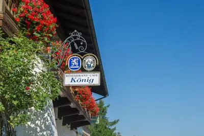 Ein Zertifikat, Auszeichnung, Logo oder anderes Dokument, das in der Unterkunft Gasthaus Café König ausgestellt ist