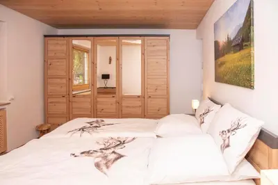 Ein Bett oder Betten in einem Zimmer der Unterkunft Ferienwohnung beim Rehberg