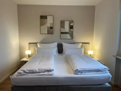 Ein Bett oder Betten in einem Zimmer der Unterkunft Terrassenwohnung in ruhiger Lage -3 Zimmer A96 nähe