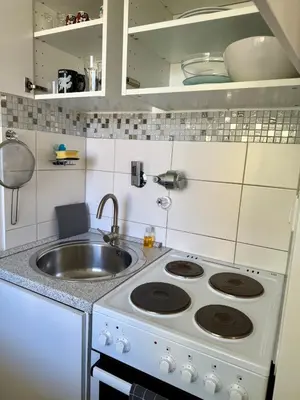 Küche/Küchenzeile in der Unterkunft Zentrales Apartment im Herzen von München