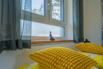 Ein Bett oder Betten in einem Zimmer der Unterkunft Ammersee-Nest Dießen
