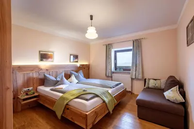 Ein Bett oder Betten in einem Zimmer der Unterkunft Seimehof Urlaub auf dem Bauernhof
