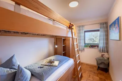 Ein Bett oder Betten in einem Zimmer der Unterkunft Seimehof Urlaub auf dem Bauernhof