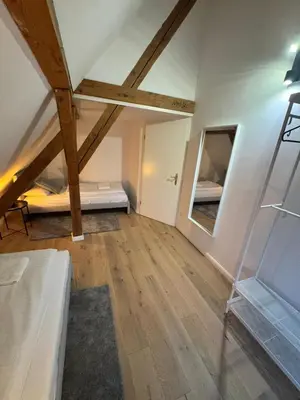 Ein Bett oder Betten in einem Zimmer der Unterkunft Bavaria Home - Zentral, Küche, Waschen, Parken