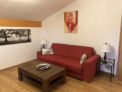 Ein Sitzbereich in der Unterkunft Ferienwohnung Gruberhof