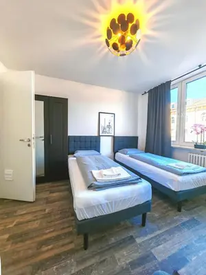Ein Bett oder Betten in einem Zimmer der Unterkunft Munique City Apartments