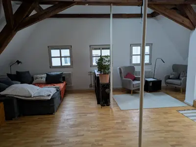 Ein Sitzbereich in der Unterkunft Ferienwohnung Kitzenmarkt
