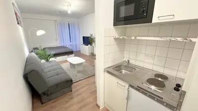 Küche/Küchenzeile in der Unterkunft Modern, quiet apartment right by S-Bahn - close to Munich & airport